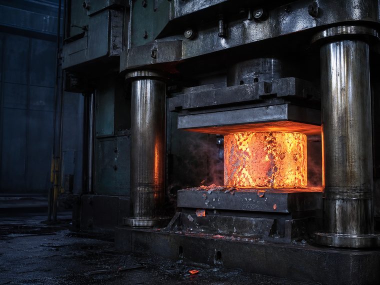 Hydraulic press forging a nickel alloy billet